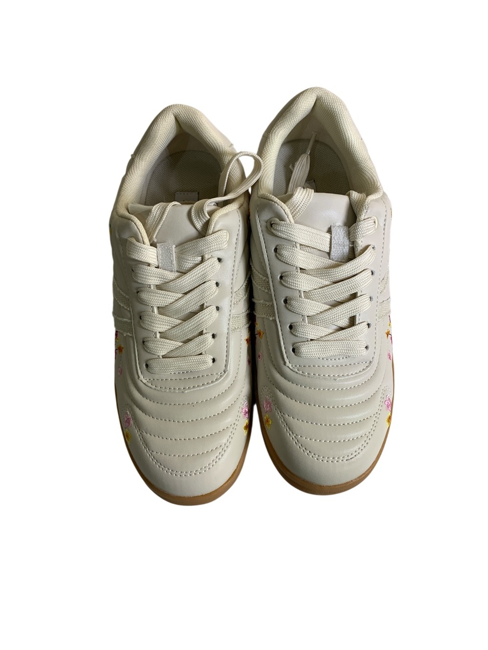 Steve Madden women’s Cream Floral Accent Sneakers